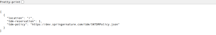 Screenshot of Nature's live /.well-known/tdmrep.json: a single rule reserving the whole site with tdm-reservation 1 and a tdm-policy link to Springer Nature's licensing terms